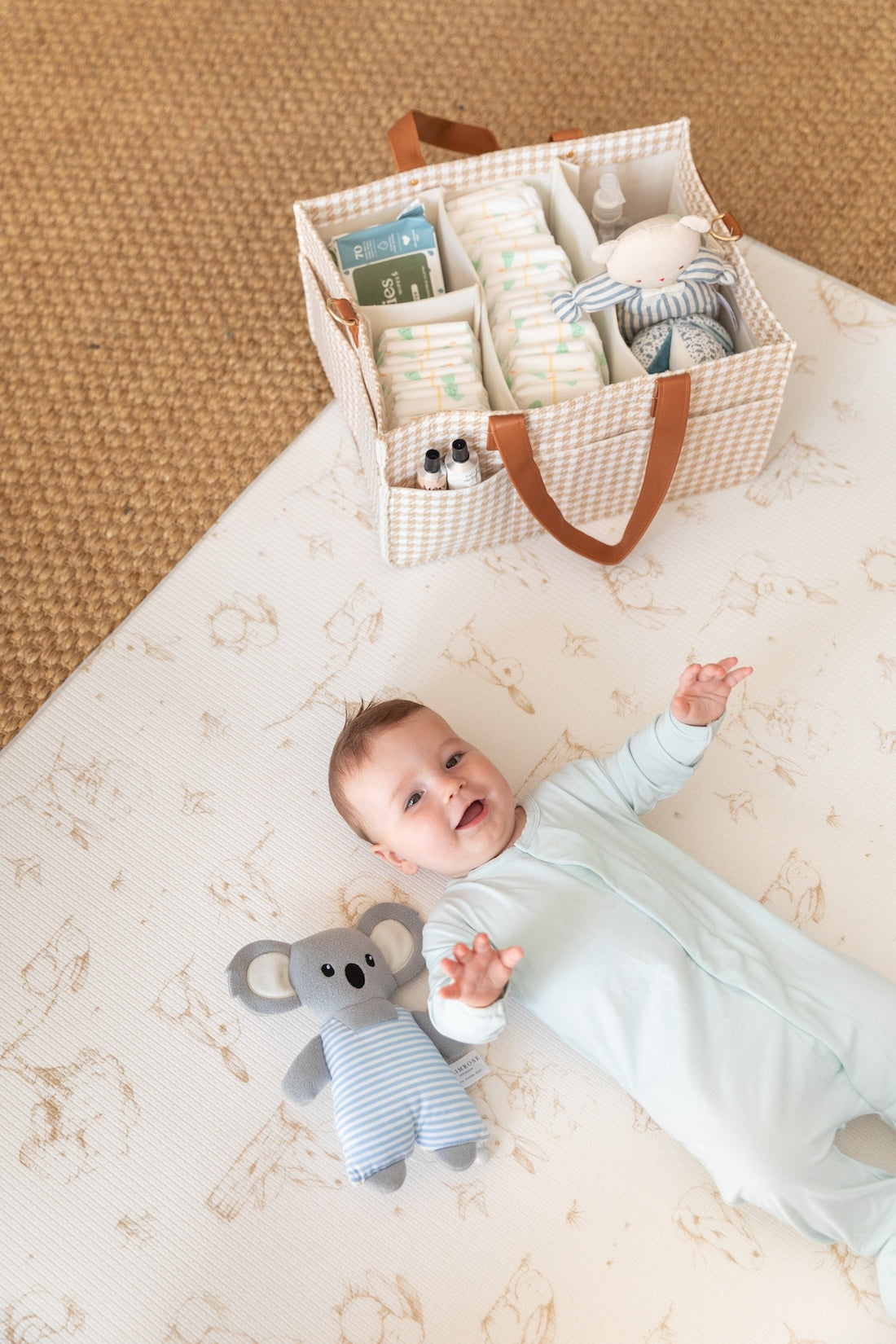 Baby playing on Little Wiwa non-toxic play mat at home