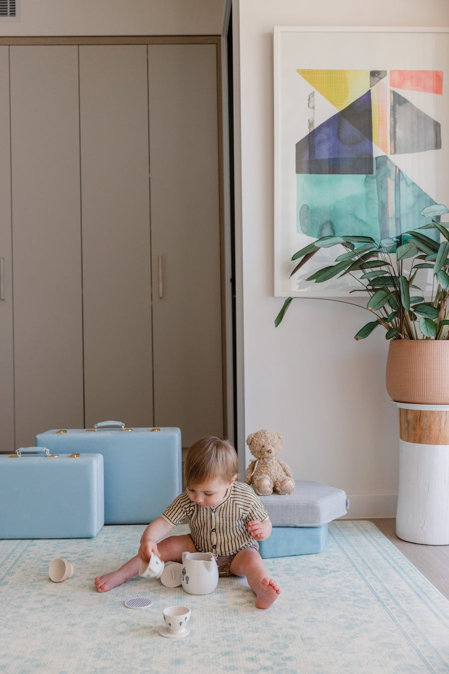 Baby playing on Little Wiwa non-toxic play mat at home